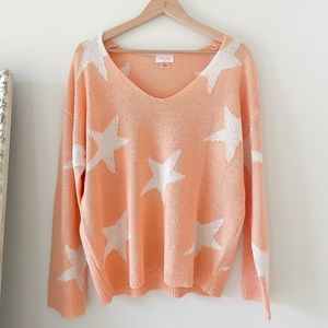 Pink lily orange star sweater